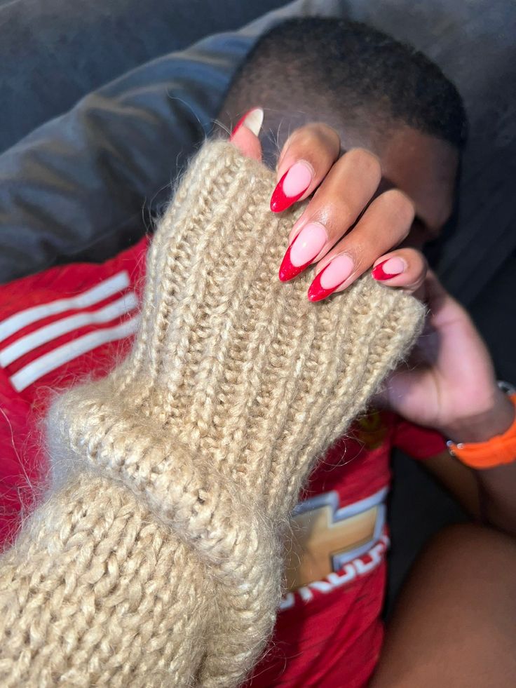 Pink Nails Red French Tip, Pink Nail Red Tip, Red Nails On Black Girls, Thick Red French Tip, Pink Nails With Red French Tip, Red French Tip Nails With Rhinestones, Red Almond Nails French Tip, Red Almond French Tip Nails, Pink Nails With Red Tips