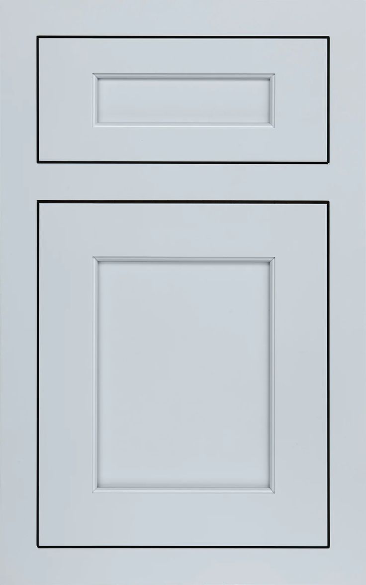 an image of two white kitchen cabinets