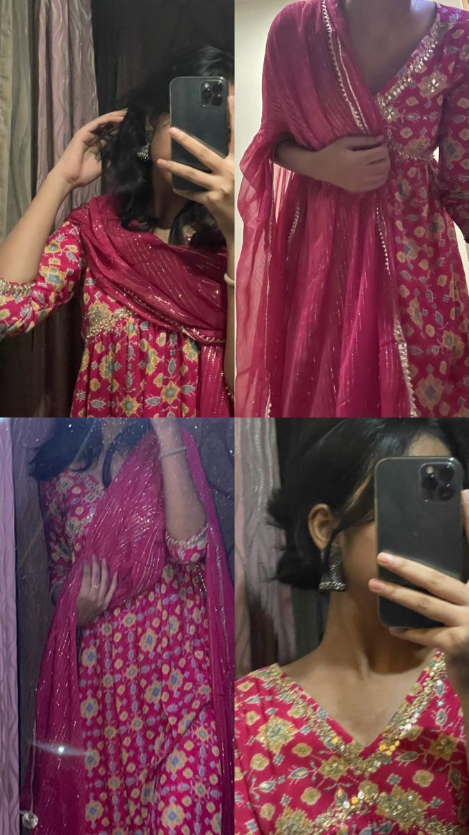 the woman is wearing a pink sari and holding a cell phone in her hand