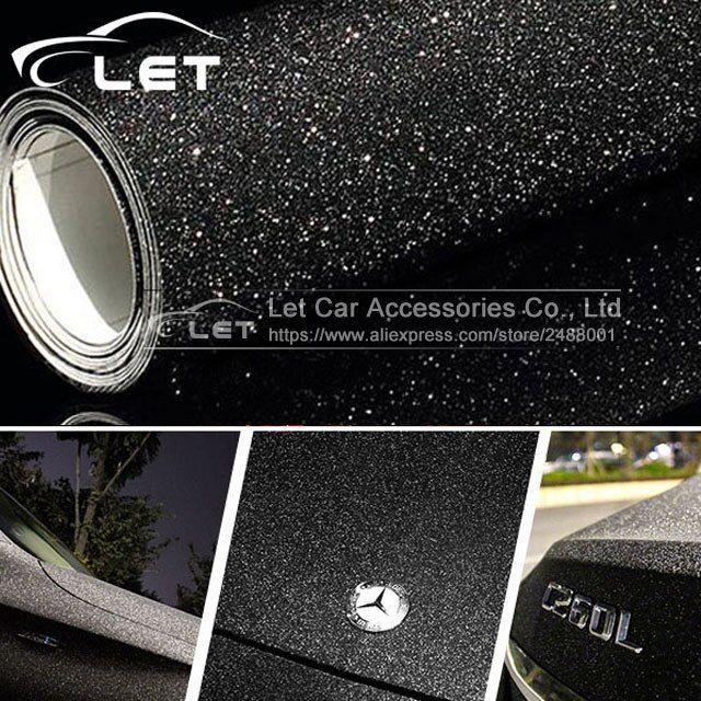 the side view of a car with its door open and it is covered in black glitter