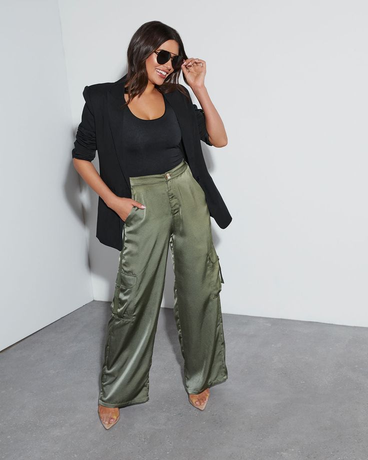 The Never Impossible Satin Cargo Pants combine the luxe look and feel of satin with the approachable, always-flattering cargo silhouette. It has a wide leg fit and pockets for anything you can think of. High rise Pocketed Wide pant leg Front zip fly & button closure 100% Polyester Silk Cargo Joggers Outfit, Outfits With Silk Pants, Green Satin Cargo Pants Outfit, Baggy Green Cargo Pants Outfit, Straight Leg Utility Cargo Pants, Satin Cargo Pants Outfit Dressy, Green Silk Pants Outfit, Silk Wide Leg Pants Outfit, Black Satin Cargo Pants Outfit