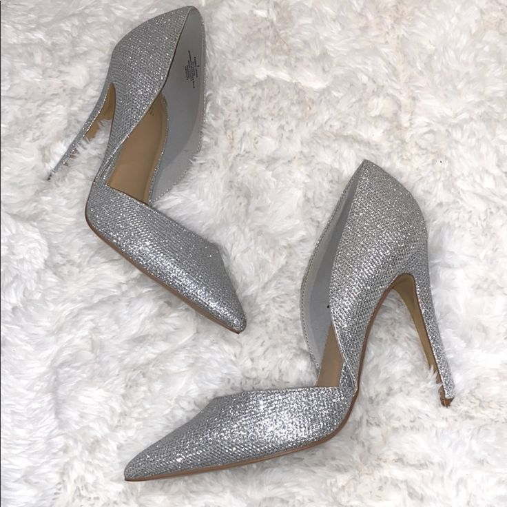 Excellent Condition, Never Worn. Silver Sparkle Sequins In Size 7. Fits Like 7.5. Chic Silver Heels With Round Toe, Glamorous Pointed Toe Shimmer Heels, Silver Round Toe Heels For Party, Silver Shiny Heels For Formal Occasions, Chic Silver Heels For Prom, Elegant Shiny Silver Heels, Formal Silver Shiny Heels, Metallic Silver Pointed Toe Heels With 4-inch Heel, Metallic Silver Round Toe Heels For Party