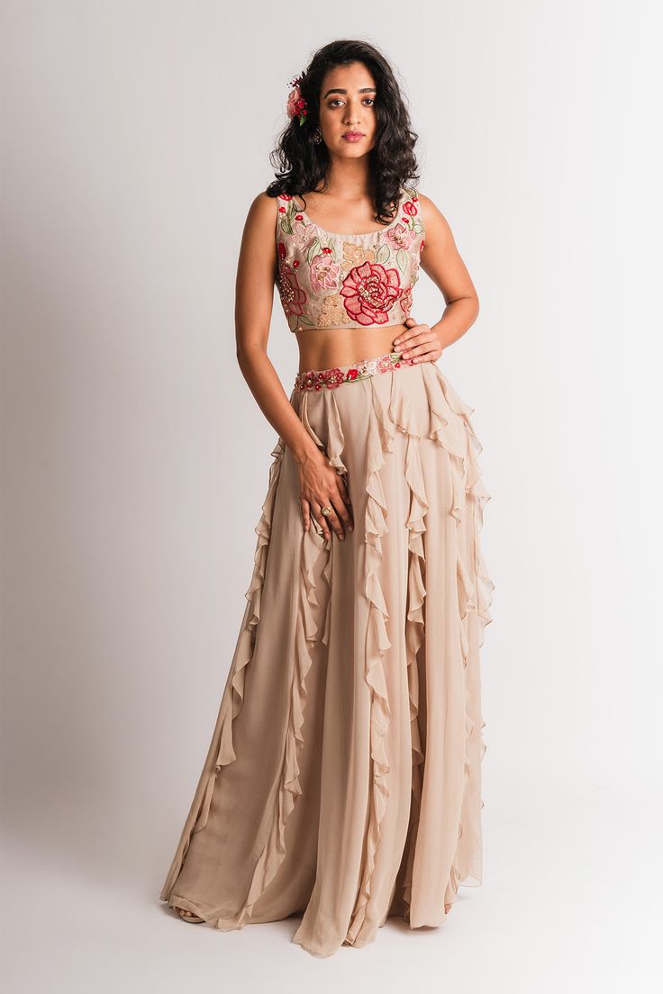 Beige high waist lehenga with ruffle detail and applique embroidered floral motifs on waistline. Comes with crop top.
Components:2
Embroidery
Neckline:Scoop
Sleeve Length:Sleeveless
Fabric:Georgette, Raw Silk
Color:Beige
Sequin and pearl embellishment on skirt waistline
Applique embroidered floral motifs on top
Sequin and pearl embellished motifs on top - Aza Fashions Western Outfits For Wedding, Crop Top With Lehenga, Top With Lehenga, Outfits For Wedding, Ruffle Lehenga, Bridal Trousseau, Lehenga Crop Top, Ghaghra Choli, One Shoulder Ruffle Top