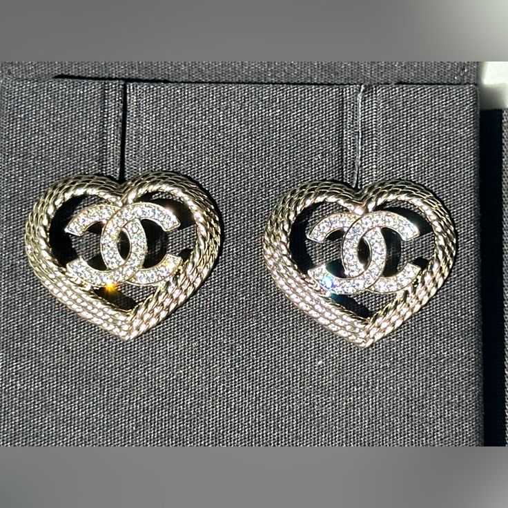 Chanel Earrings New In Box. Luxury Sterling Silver Heart Cut Earrings, Luxury Heart Cut Sterling Silver Earrings, Luxury Heart Cut Earrings With Diamond Accents, Luxury Silver Heart Cut Earrings, Luxury Sterling Silver Heart Earrings For Anniversary, Luxury Pierced Earrings For Valentine's Day, Luxury White Gold Heart Cut Earrings, Luxury Heart Shaped Jewelry For Evening, Luxury Heart-shaped Jewelry For Evening