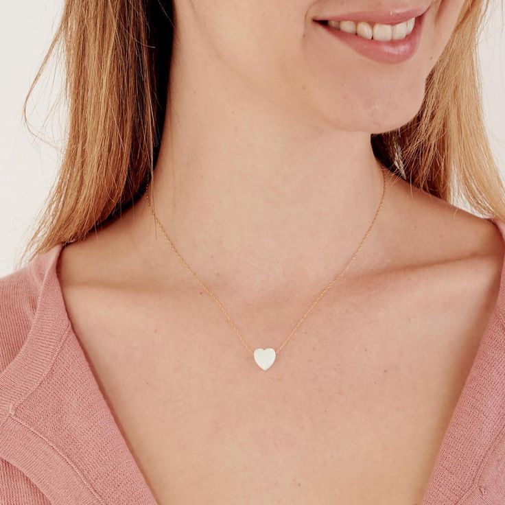 White Minimalist Jewelry With Heart Charm, Minimalist White Heart Charm Jewelry, Dainty White Jewelry With Heart Charm, White Feminine Necklace With Heart Charm, Feminine White Jewelry With Heart Charm, Feminine White Necklace With Heart Charm, White 14k Gold Heart Necklace For Gift, Dainty White Heart Pendant Necklace, White 14k Gold Dainty Charm Necklace