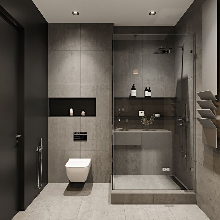 a modern bathroom with black and white decor