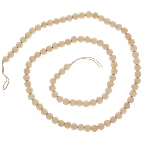 a white beaded necklace and bracelet set