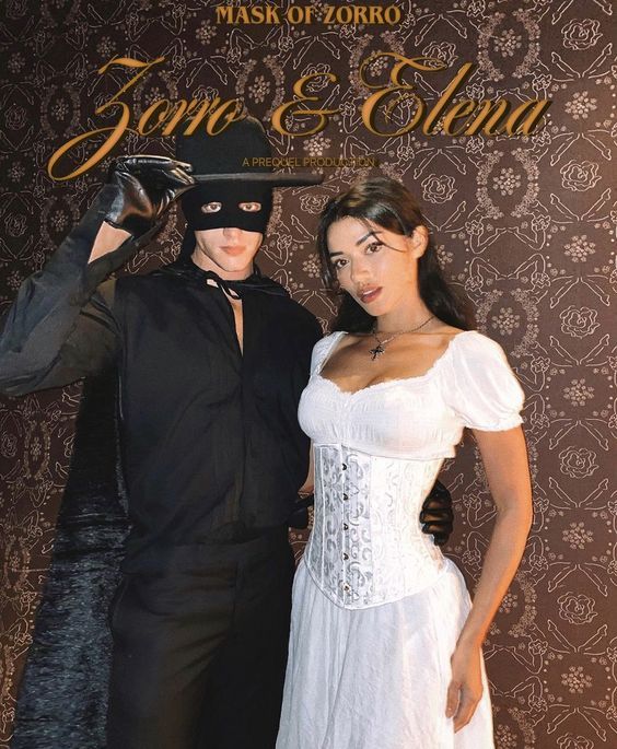 a man and woman dressed up in costume posing for a photo with a mask on