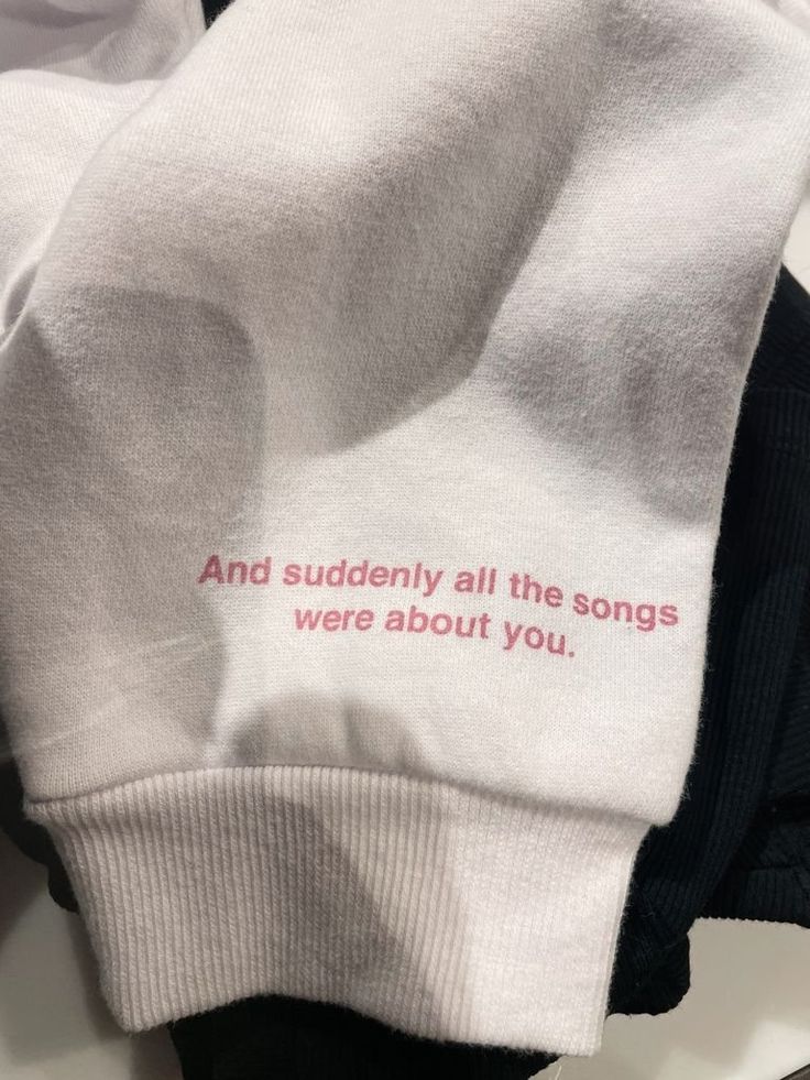 a pair of socks with the words and silently all the songs were about you