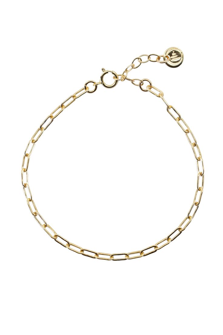 Introducing the Elements Cable Chain Gold Bracelet. This stunning bracelet is crafted from 14K gold plated brass, exuding timeless elegance. With its adjustable clasp, it offers the perfect fit for any wrist. Elevate your style with this exquisite piece that effortlessly combines sophistication and versatility. Classic Adjustable Chain Bracelet With Oval Links, Classic Gold Plated Charm Bracelet, Tarnish Resistant, Classic Gold Plated Charm Bracelet Tarnish Resistant, Classic Metal Charm Bracelet With Adjustable Chain, Classic Gold Plated Tarnish Resistant Charm Bracelet, Classic Charm Bracelet With Adjustable Chain, Classic Gold Charm Bracelet With Jubilee Detail, Classic Adjustable Tarnish Resistant Chain Bracelet, Classic Gold Charm Bracelet With Jubilee Bracelet