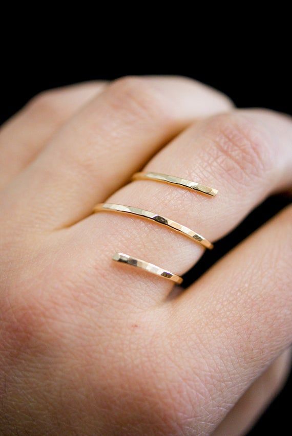 *PLEASE NOTE: The SMOOTH finish option will be more fragile than the HAMMEREDThis item is made to order and will ship after 7-10 business days. That time does not include holidays, weekends or shipping time!This ring is one of my absolute favorites! I twist a length of Gold-Filled wire into a spiral shape and gently hammer it. The hammered effect adds lots of shine and sparkle, so even through the wire itself is very light and feminine, the ring has a big impact overall.This ring has a wonderful Adjustable 14k Gold Minimalist Bypass Ring, Minimalist Adjustable 14k Gold Bypass Ring, Gold Spiral Minimalist Stackable Rings, Minimalist Spiral Rings For Everyday, Minimalist Everyday Spiral Rings, Minimalist 14k Gold Spiral Ring, Gold Minimalist Adjustable Bypass Ring, Adjustable Spiral Midi Rings In Minimalist Style, Minimalist 14k Gold Spiral Jewelry