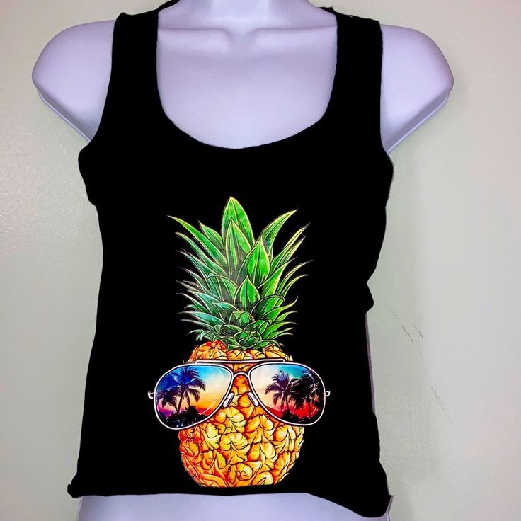 Feeling Tropical Pineapple Oversized Cropped Tank Love These Tanks For The Beach Over A Bathing Suit Cropped Oversized Racerback Back New Without Tags Would Fit S-L Trendy Black Top For Beach Season, Trendy Black Tops For Beach Season, Casual Black Printed Tank Top, Black Tropical Beach Tops, Black Tropical Print Casual Tops, Casual Black Tops With Tropical Print, Casual Black Top With Tropical Print, Black Tops With Tropical Print For Beach Season, Black Tropical Style Tops With Tropical Print