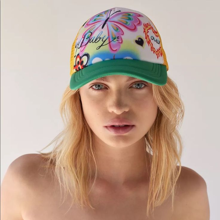 Dream Of Paradise In This Summery Trucker Hat Featuring A Graphic Airbrush Front. Fitted With Mesh Back Panels And An Adjustable Snap Closure. Content + Care - 100% Polyester - Spot Clean - Imported Trendy Beach Trucker Hat For Spring, Trendy Trucker Hat For Beach In Spring, Trendy Trucker Hat For Beach And Spring, Trendy Spring Sun Cap, Spring Summer Trucker Hat, Summer Retro Baseball Cap, Playful Adjustable Hats For Spring, Adjustable Short Brim Trucker Hat For Spring, Trendy Snapback Sun Hat For Spring