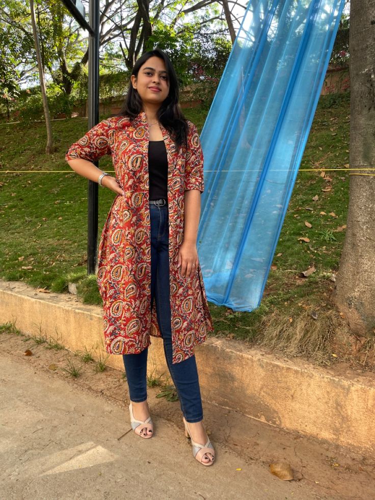 Long shrug Westan Top New Long Kurti, Srug Style Dress, Long Shrug For Women, Saree With Long Shrug, Kalamkari Shrug, Red Shrug Outfit, Shrugs For Dresses Western, Short Shrugs For Indian Dresses, Shrugs With Jeans Outfit