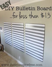 three vertical blinds are hanging on the wall in a kitchen area with tile flooring