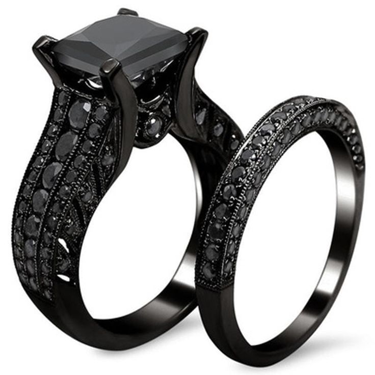 two black wedding rings with diamonds on each side and the words, black wedding rings overstock