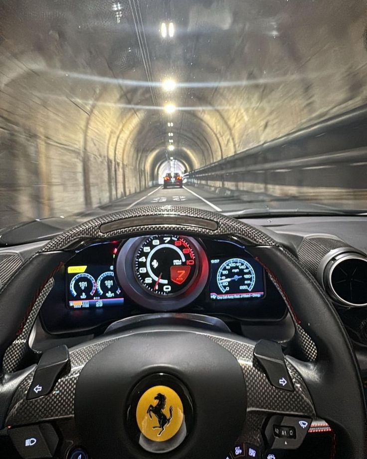 the interior of a car driving through a tunnel