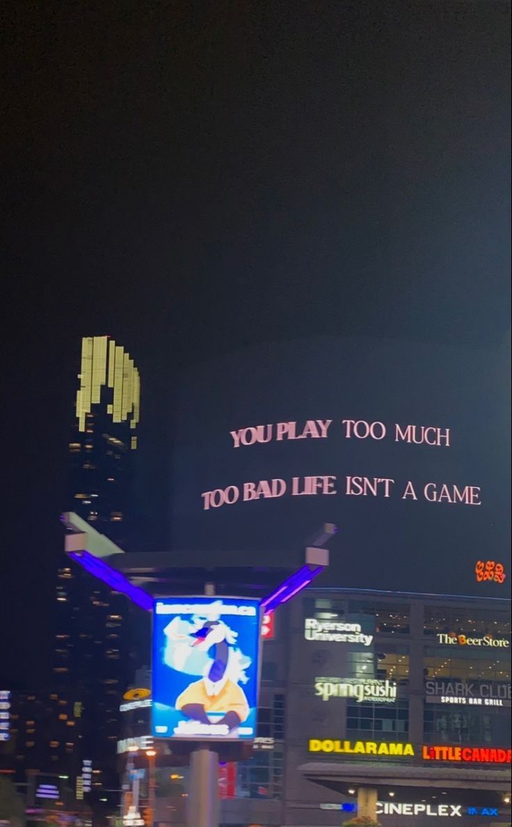 an advertisement on the side of a building that says you play too much, too bad life isn't a game