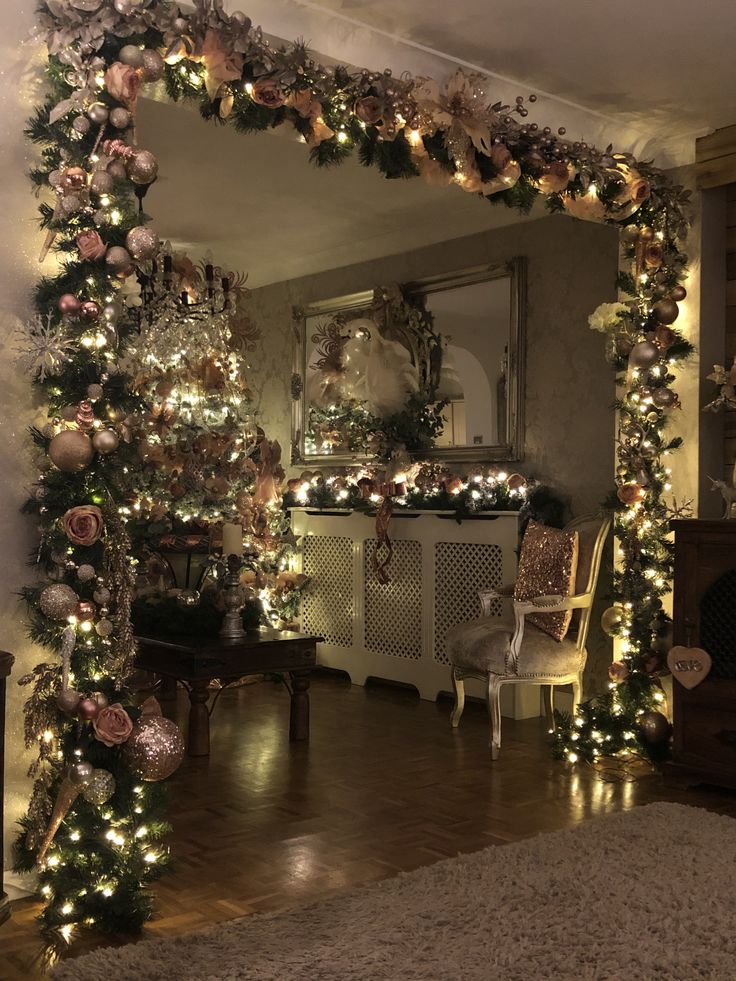 a living room decorated for christmas with lights