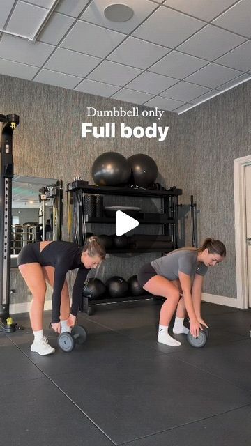 two women doing push ups on dumbbells in a gym with the words dumbbell only full body