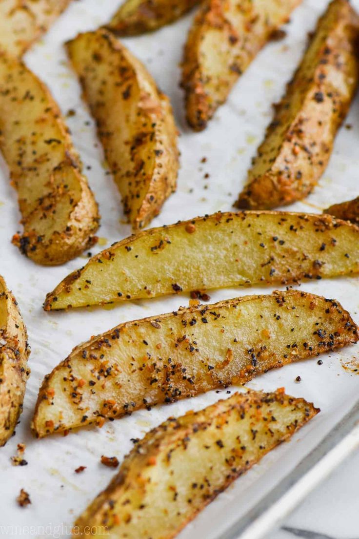 seasoned french fries on a tray ready to be eaten