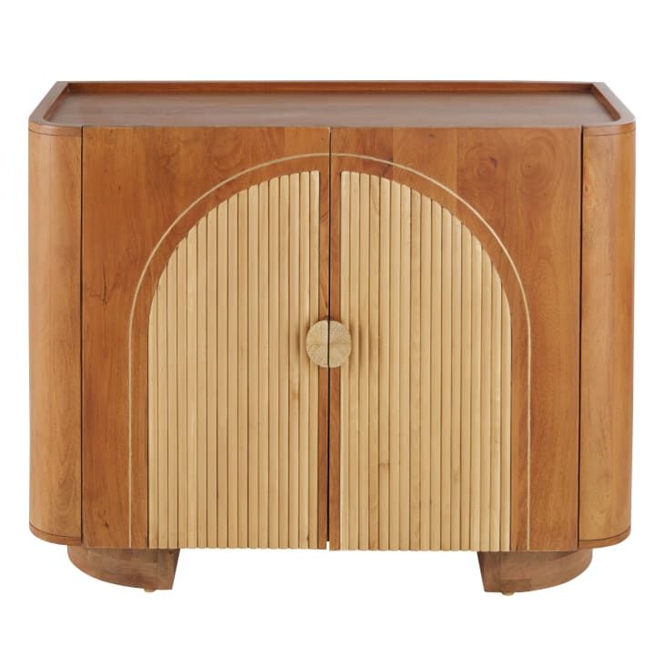 a wooden cabinet with an arched door on the front and side paneled in bamboo