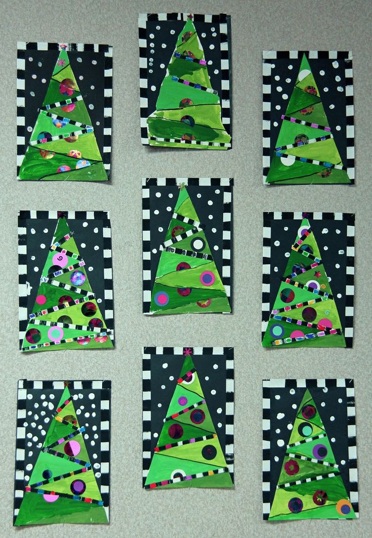 six pieces of paper cut out to look like christmas trees on black and white squares