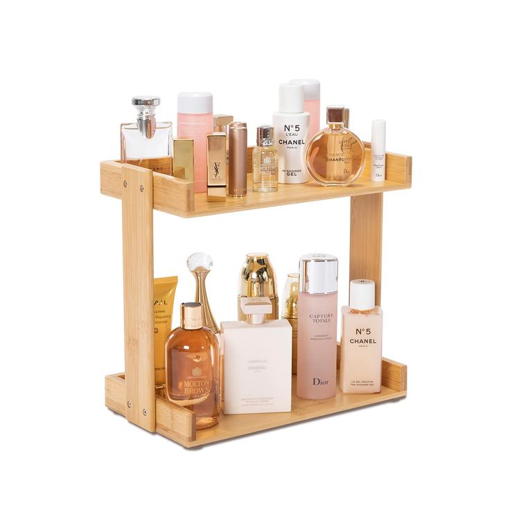 two wooden shelves holding different types of perfumes