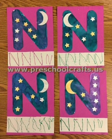 the letters n and n are made out of paper with stars and moon on them