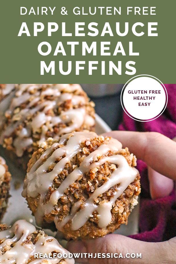 a close up of a person holding an oatmeal muffin