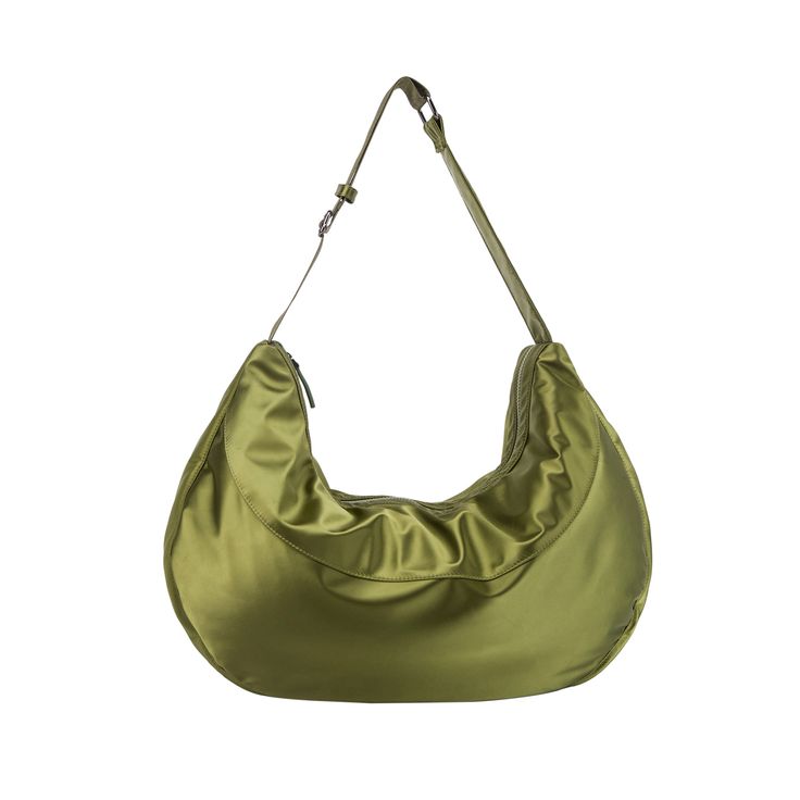 an olive green bag hanging on a hook