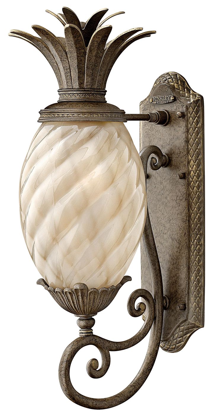 a wall light with a white glass ball on the front and back of it's arm