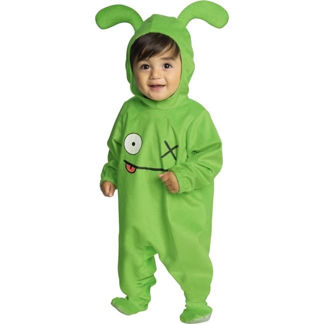 a little boy in a green costume with ears and eyes on it's head