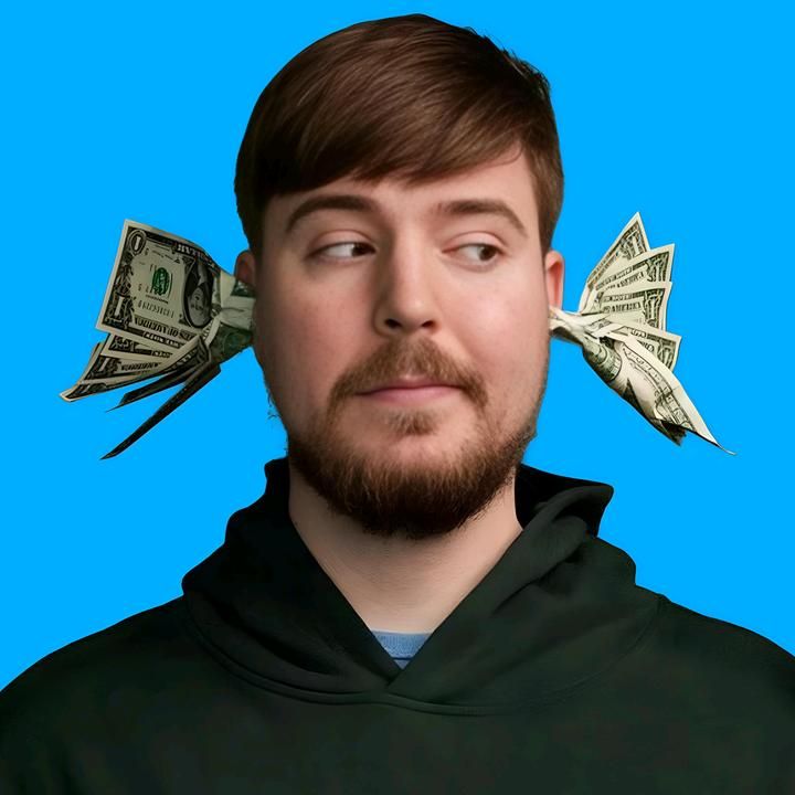 a man wearing a black hoodie with dollar bills sticking out of his ears on top of his head