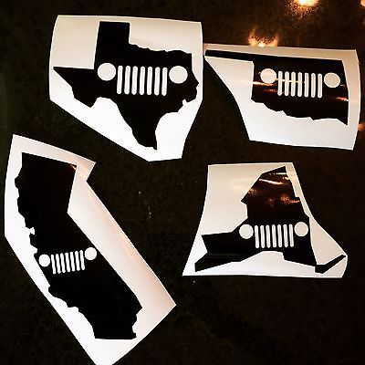 four white decals with the shape of a jeep on them, all in different shapes and sizes