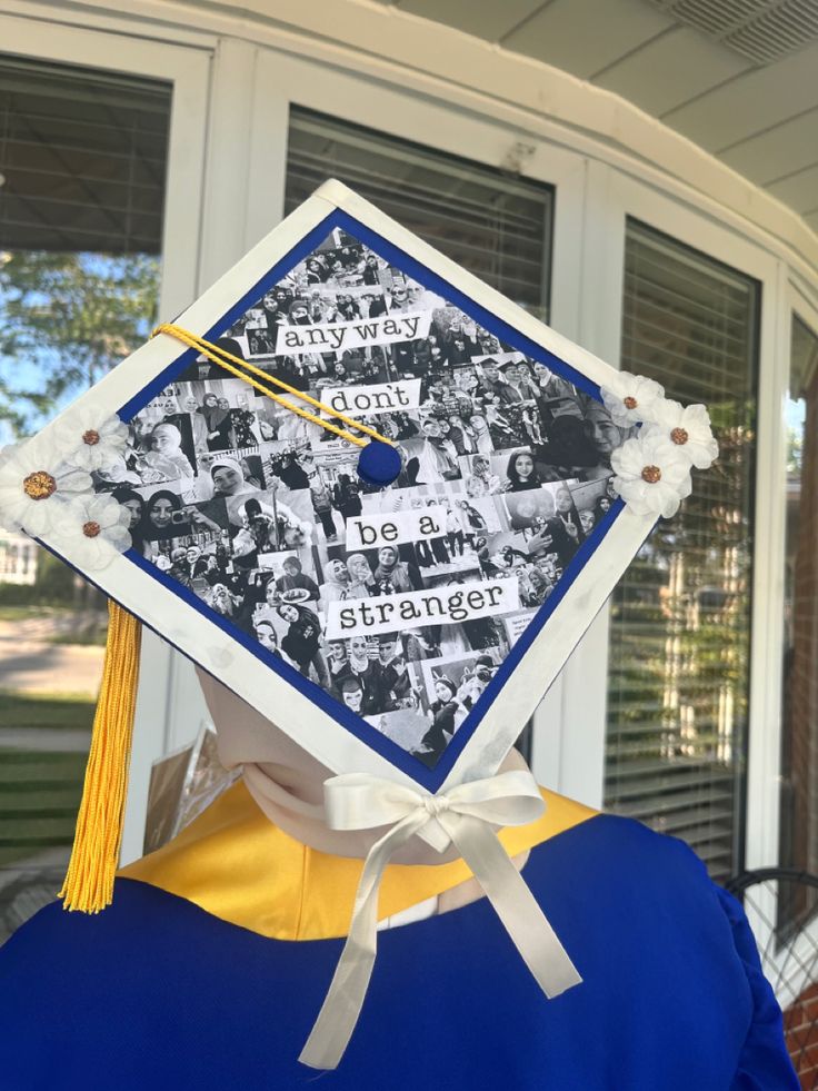 a graduation cap decorated with photos and words