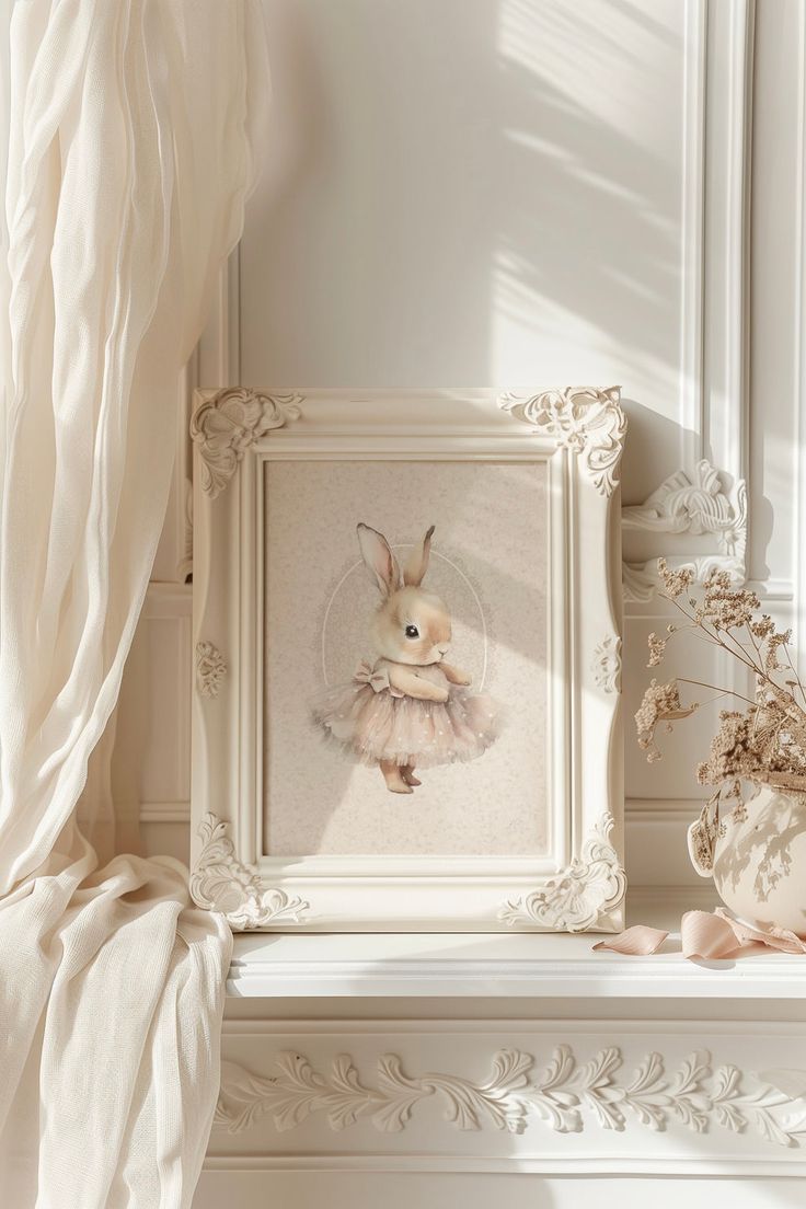 a white frame with an image of a bunny in a ballet outfit on it next to a window