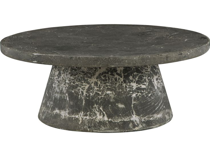 a round table with black and white paint on the top, sitting in front of a white background