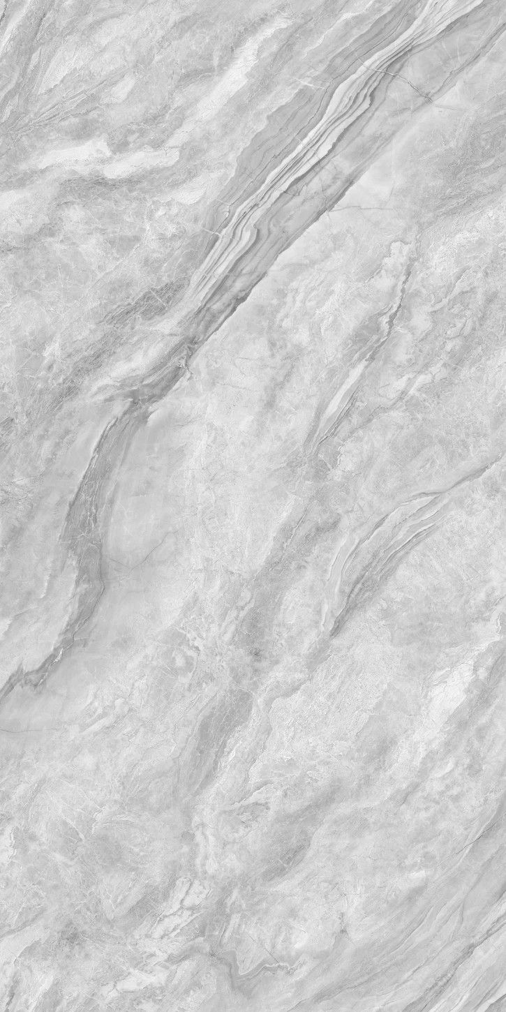 a white marble textured surface with grey streaks