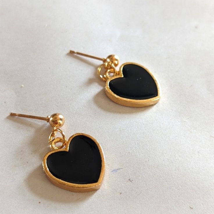 Dangling Black Hearts Gold Plated/Alloy Trendy Black Heart-shaped Earrings, Black Heart-shaped Earrings For Gift, Trendy Black Heart Earrings For Gift, Black Heart Charm Earrings As Gift, Black Heart Charm Earrings For Valentine's Day, Black Earrings With Heart Charm For Gift, Black Heart Earrings For Gift, Black Heart Charm Earrings For Gift, Black Heart Earrings With Heart Charm For Gift