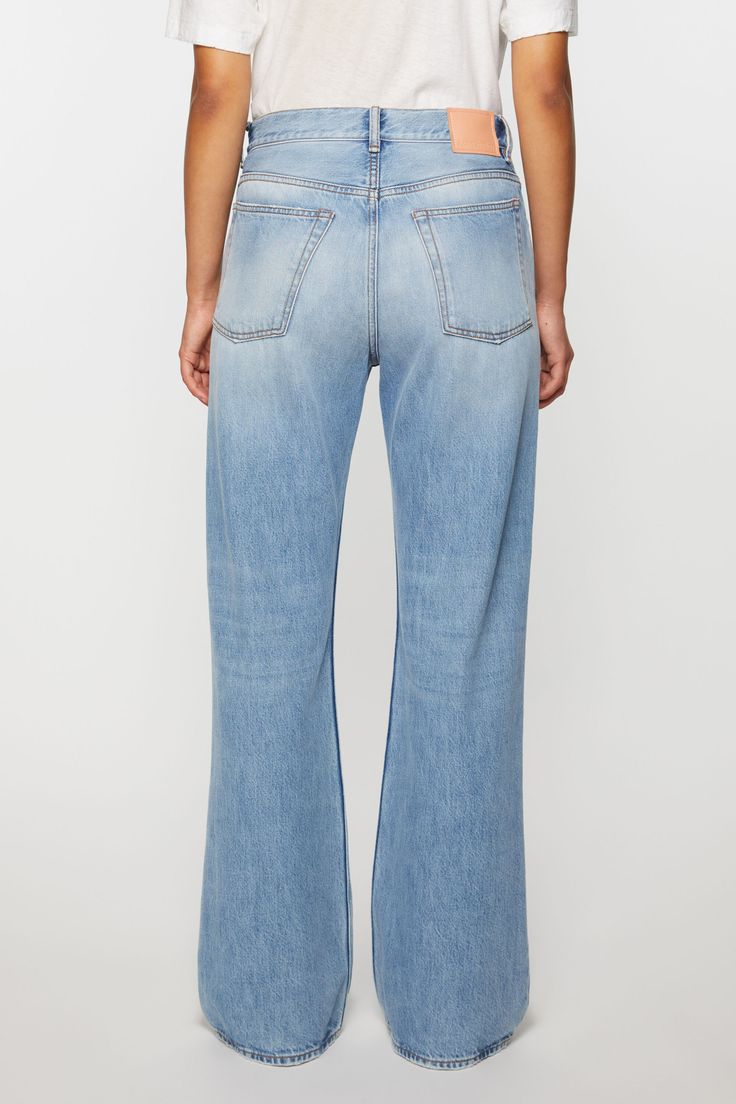 2021 jeans are cut to a loose fit with mid-waist, wide leg and long length. Made from rigid denim in light blue wash. Acne Studios 2021F Light Blue Vintage Summer Washed Blue Rigid Denim Flare Jeans, Washed Blue Cropped Leg Flare Jeans, Wide Leg Cropped Jeans In Recycled Denim, Washed Blue Wide Leg Flare Jeans With Five Pockets, Light Indigo Wide Leg Jeans With Five Pockets, High Rise Washed Blue Flare Jeans, Light Indigo Wide-leg Jeans With Five Pockets, Spring Recycled Denim Wide Leg Flare Jeans, Spring Wide Leg Flare Jeans In Recycled Denim