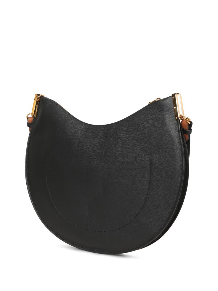 This elegant Coccinelle shoulder bag is crafted from premium black leather with golden metal details, offering a perfect blend of style and functionality. Modern Crossbody Hobo Bag With Gold-tone Hardware, Chic Saddle Bag With Gold-tone Hardware, Chic Saddle Shoulder Bag With Gold-tone Hardware, Chic Black Saddle Bag With Metal Hardware, Modern Saddle Bag With Gold-tone Hardware For Work, Chic Office Bags With Brass Hardware, Modern Office Shoulder Bag With Brass Hardware, Chic Black Saddle Bag With Branded Hardware, Chic Business Saddle Bag With Gold-tone Hardware