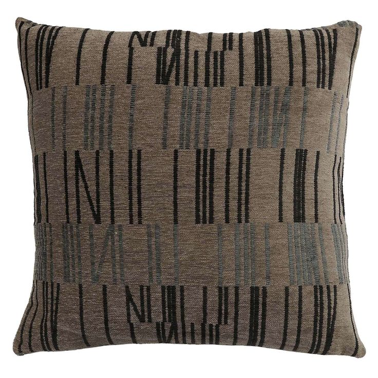 a brown and black pillow on a white background with vertical lines in the middle,