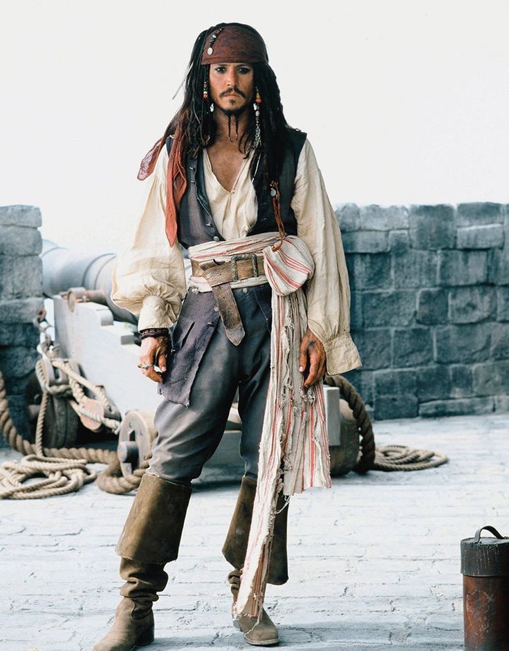 a man dressed as captain jack sparrow on the set of pirates of the carraige