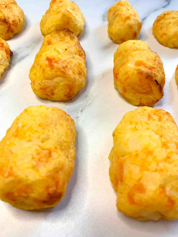 some food that is laying out on a counter top and ready to be cooked in the oven