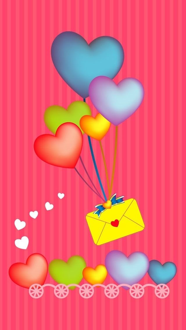 some hearts are flying in the air over a cart with a mail box on it