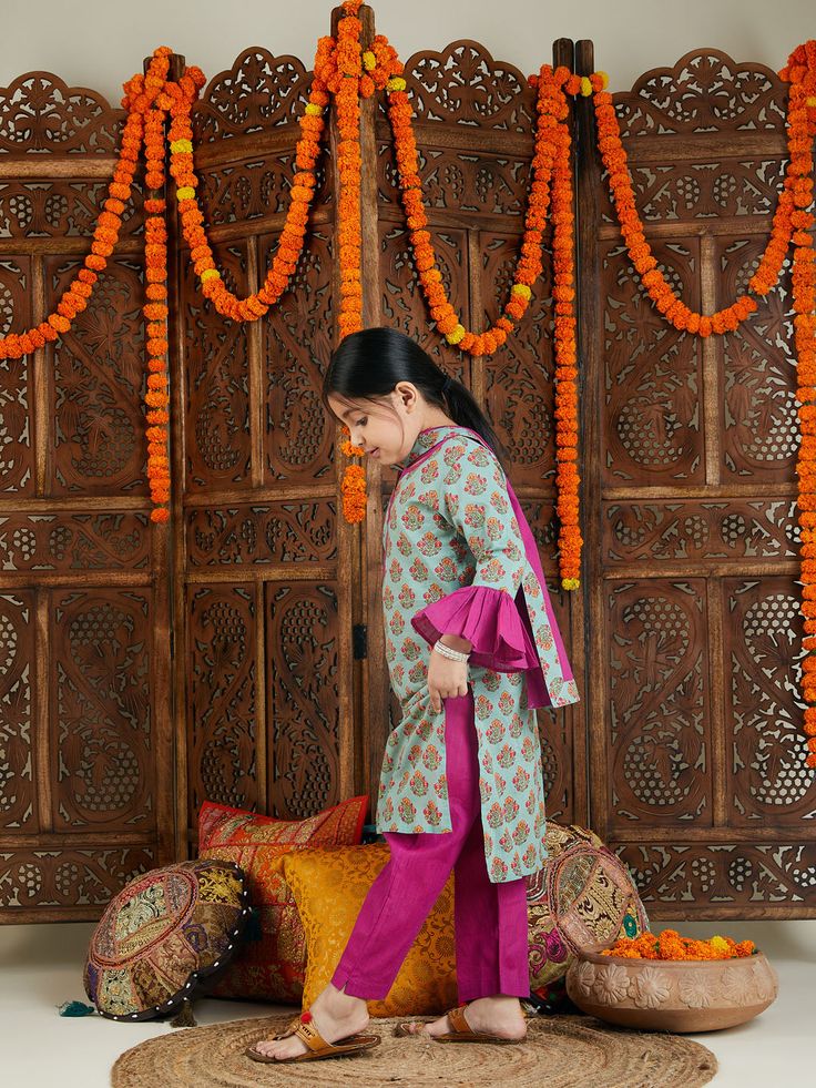 VASTRAMAY Girls' Green & Pink Kurta Pant Dupatta Set Adorable green and pink kurta pant dupatta set for girls. Features bell sleeves, round neck, and contrasting color details. Paired with comfortable elasticated cotton striped pants. Perfect for parties and special occasions! Key Features Bell sleeves Round neck Contrasting color details Elasticated cotton striped pants Specifications Sleeve Length - Full sleeves Top Shape - Straight Top Type - Kurta Bottom Type - Pyjama Material & Care Dry cle Green Pant Set With Zari Work For Diwali, Green Zari Work Pant Set For Diwali, Pink Pant Set With Dabka Work For Diwali, Festive Pista Green Pant Set For Eid, Festive Green Pant Set For Eid, Pink Pant Set With Zari Work And Straight Kurta, Pink Straight Kurta Pant Set With Zari Work, Bollywood Green Pant Set For Navratri, Green Pant Set With Dupatta For Eid