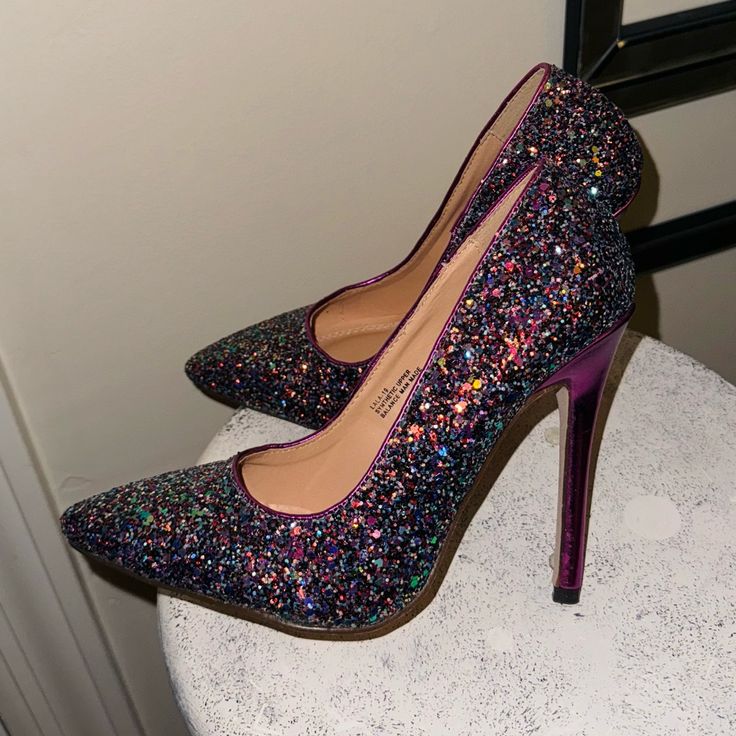 Purple Heels Size 5.5 Glitter Never Worn Multicolor 4-inch Heels For Party, Multicolor Pointed Toe Heels For Party, Glamorous Pointed Toe Shimmer Heels, Multicolor Pointed Toe Heels For Night Out, Shimmer Pointed Toe Heels For Night Out, Glamorous Heels With Glitter Print For Party Season, Glamorous Purple Party Heels, Multicolor Heels With 4-inch Heel For Night Out, Multicolor 4-inch Heels For Night Out