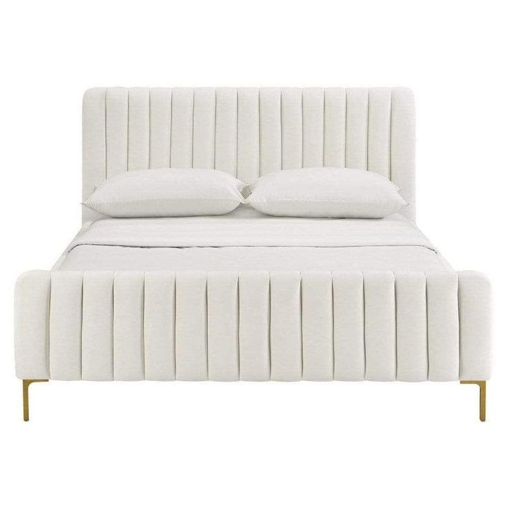 a white bed with two pillows on top of the headboard and foot board, in front of a white background