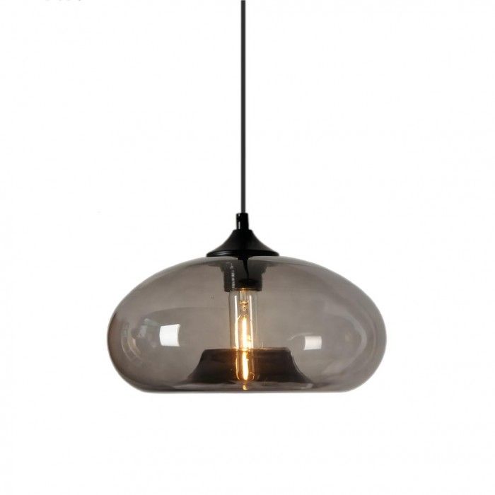 a clear glass light hanging from a black cord